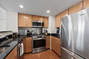 Kitchen with newer appliances.