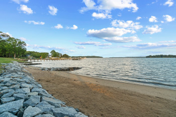 Private sandy Community Beach offering direct water access to the expansive Magothy River