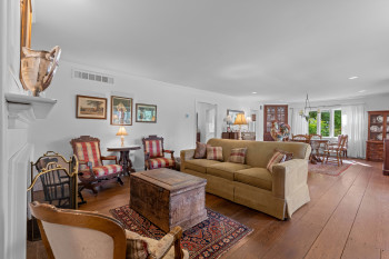 The wide-plank wood flooring makes this room special