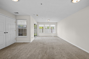 Large family room on entry level with tons of natural light, slider to the back yard, storage and laundry