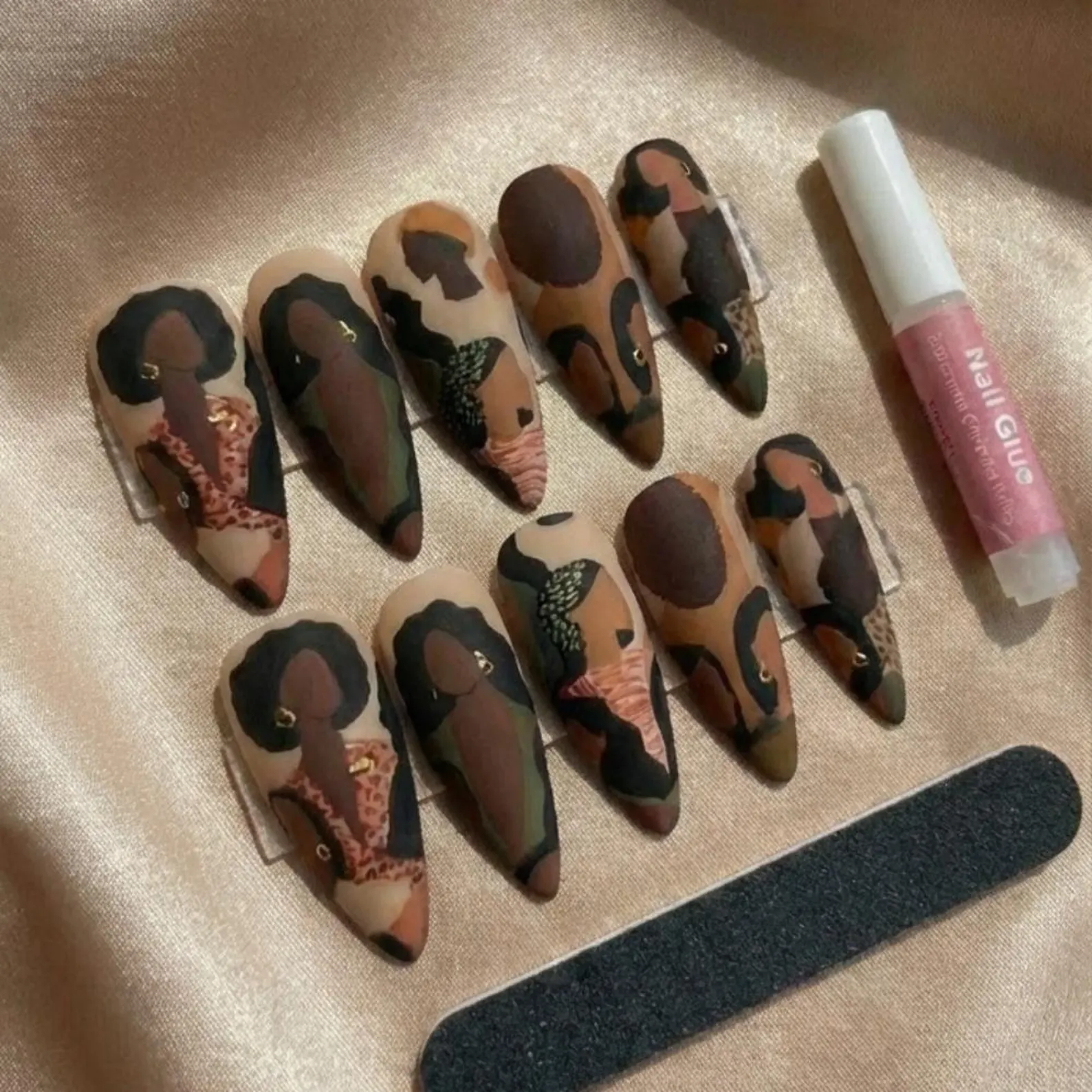 earthy almond nails, hand-painted portrait nails, press on nails, custom press on nails, fake nails, Nails Art, stained glass nails, gold press on nails, 3d press on nails, luxury press on nails, handmade press on nails