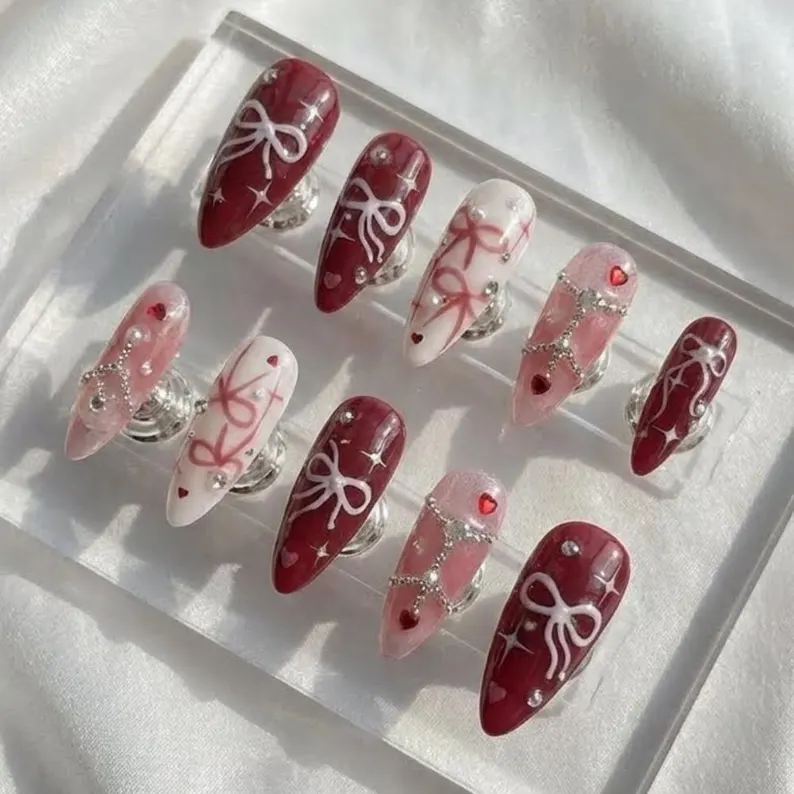 burgundy bow, pearl nail art, press on nails, custom press on nails, fake nails, Nails Art, stained glass nails, gold press on nails, 3d press on nails, luxury press on nails, handmade press on nails