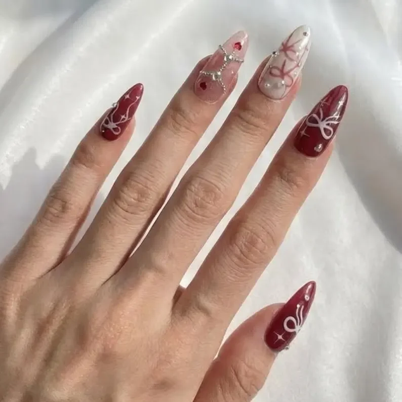burgundy bow, pearl nail art, press on nails, custom press on nails, fake nails, Nails Art, stained glass nails, gold press on nails, 3d press on nails, luxury press on nails, handmade press on nails