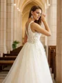 A-Line/Princess Tulle Applique V-neck Sleeveless Cathedral Train Wedding Dresses