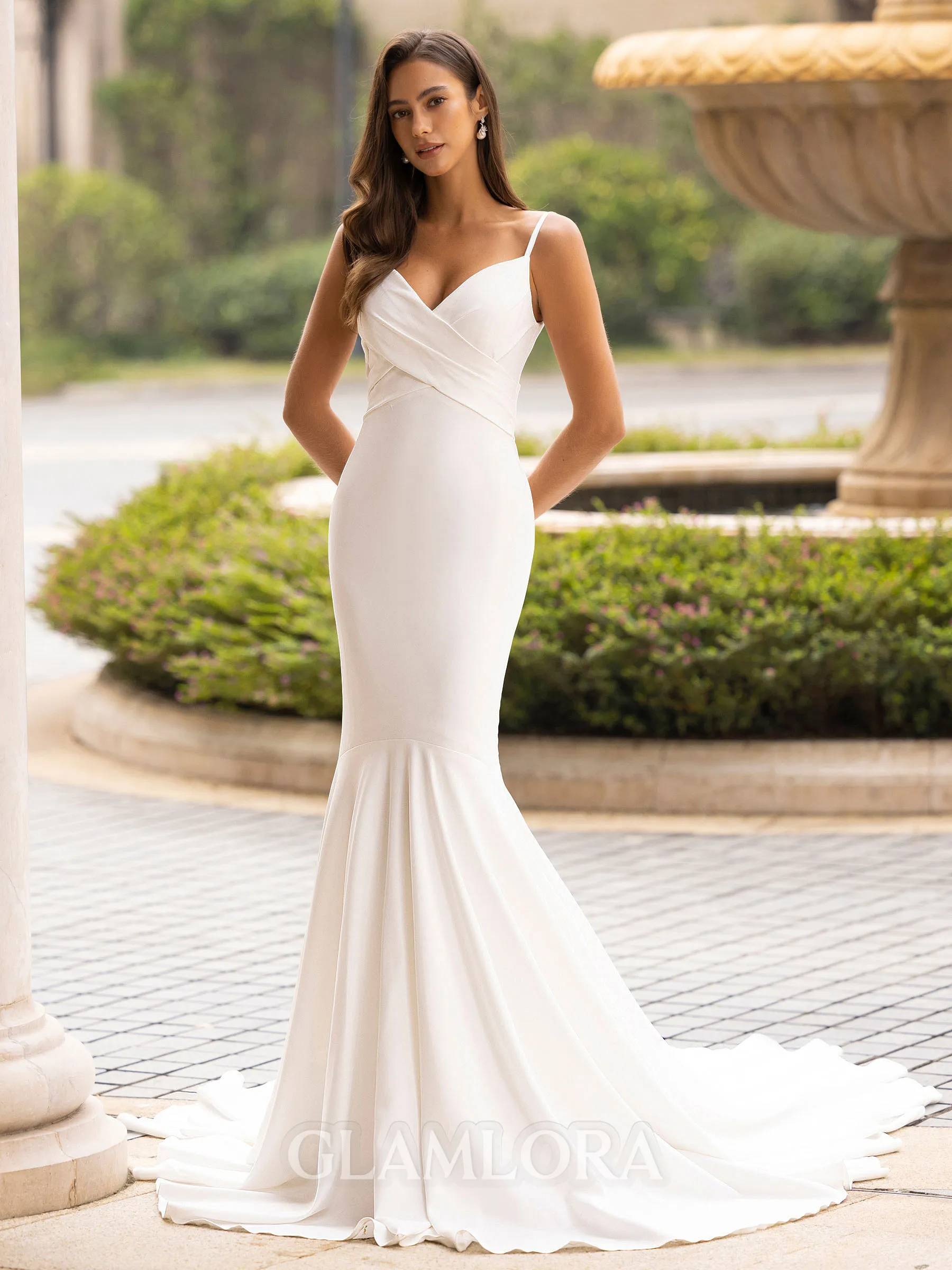 Elegant Trumpet/Mermaid Stretch Crepe Ruffles V-Neck Sleeveless Sweep/Brush Train Wedding Dress