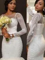 Trumpet/Mermaid Exquisite Scoop Long Sleeves Sweep Train Tulle Wedding Dress With Beading