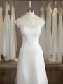 Luxurious A-line Scoop Chapel Train Satin Wedding Dress With Applique