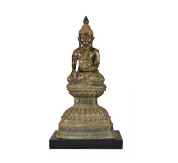 A Bronze seated Buddha on a double Lotus base