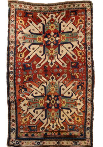 Lot 1079: A Kazak Karabagh area rug, $800-1,200 Sold: $3,125