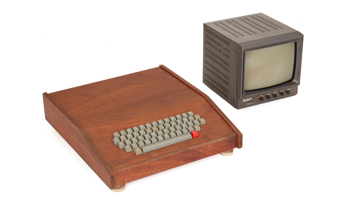 Apple-1, 1976-1977 Monitor, a folder of miscellaneous user manuals and associated documents, 2 cassette tapes, and 3 wires $400,000-600,000