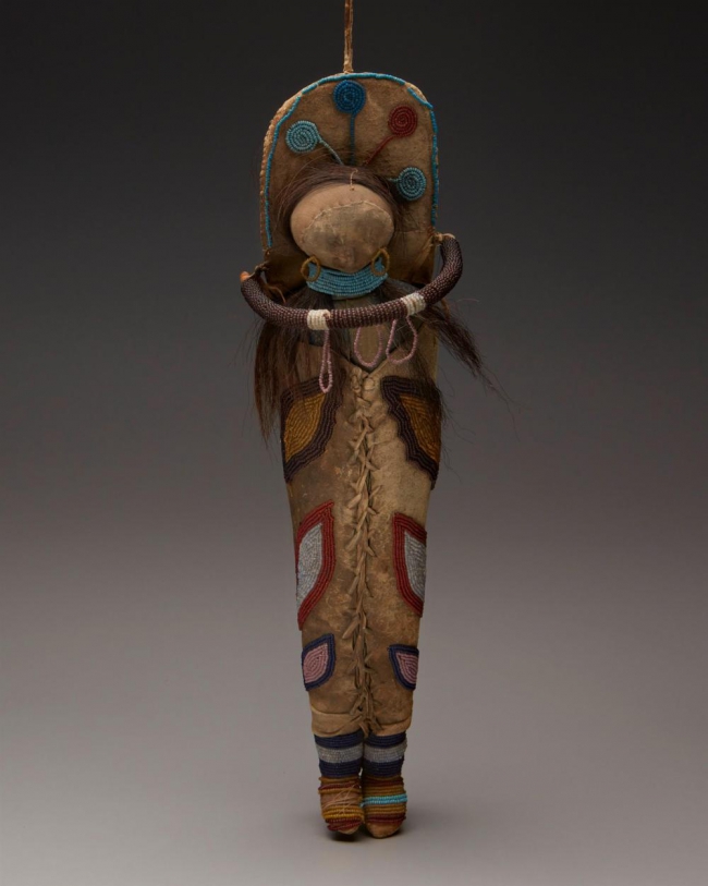 An Umatilla Indian hide doll and cradleboard $2,000-3,000