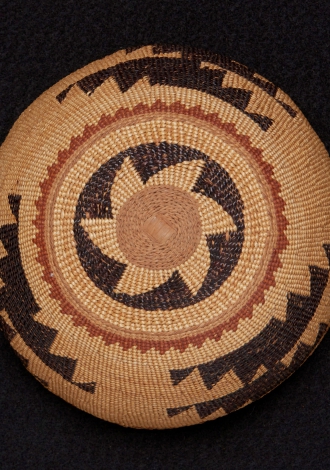 A polychrome Hupa/Yurok/Karuk basket hat $500-700
