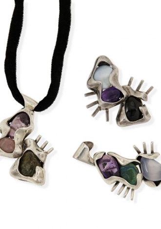 Three Salvador Terán interchangeable silver and hardstone pendants $300-$500 Sold: $2,000