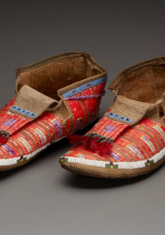 Lot 20: A Pair of Sioux Beaded and Quilled Hide Moccasins $600-$800 Sold: $2,125.00