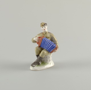 Soldier Playing Accordion Figure