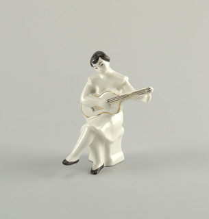 Girl Playing Guitar Figure