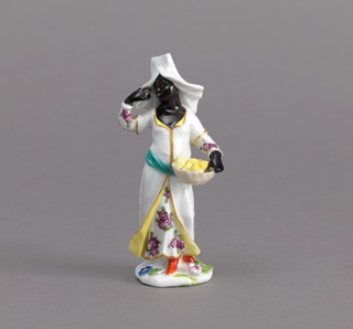 Blackamoor Figure of a Fruit Vendor Figure