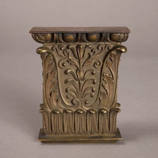 Furniture Mount in the form of a Capital Furniture Mount