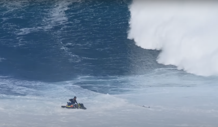 Watch a Big Wave Thrash Kai Lenny, and Crash a Jetski | GearJunkie