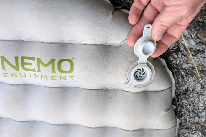 Close-up of the NEMO Tensor Elite Sleeping Pad’s valve with the cap open