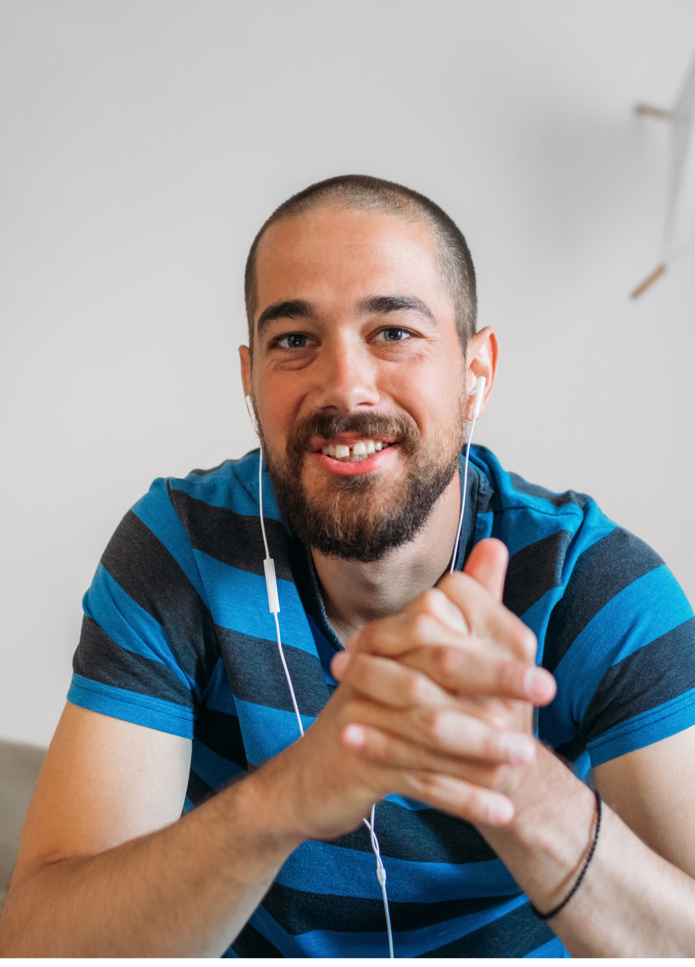 Portrait of a fine-looking man talking on a video call on his phone