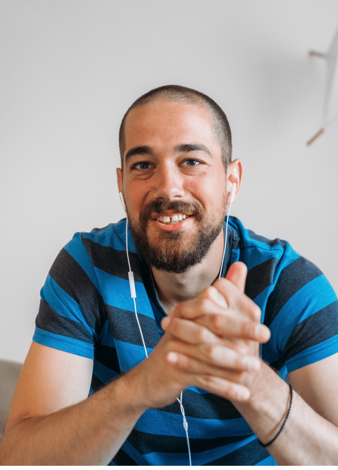 Portrait of a fine-looking man talking on a video call on his phone
