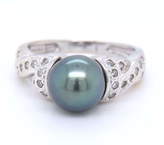 14kt White gold black pearl and diamond ring