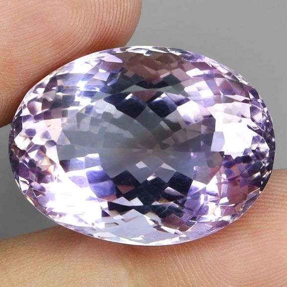 Holy cow! It's a 37.23ct pink lavender Amethyst from Bolivia!