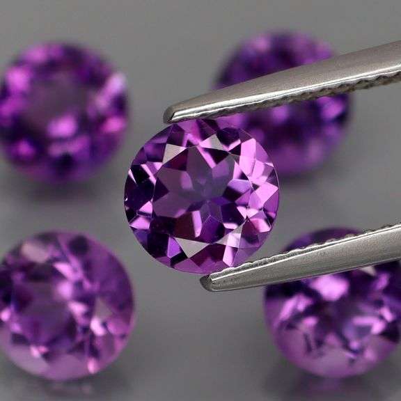 Top grade! 5.97ct round cut Bolivian Amethyst set!