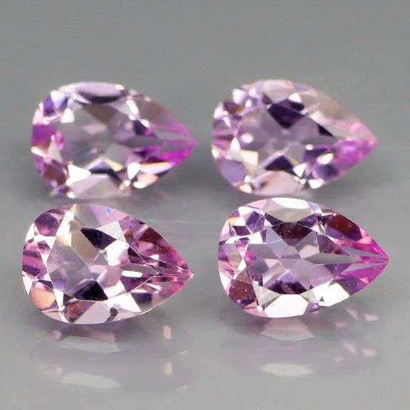Glittering 7.16ct pear cut Bolivian Amethyst set