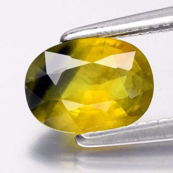 Strong color definition! 1.21ct bi-color Sapphire!