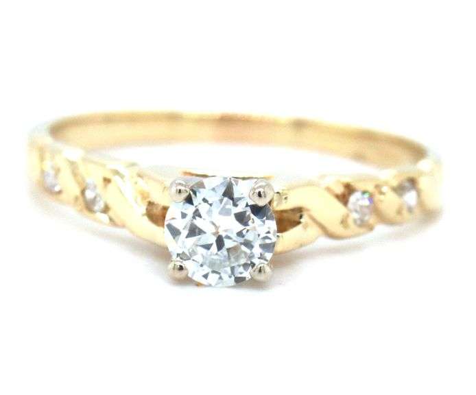 14kt Yellow gold 0.45ct European cut with single cut diamond Cathedral ring