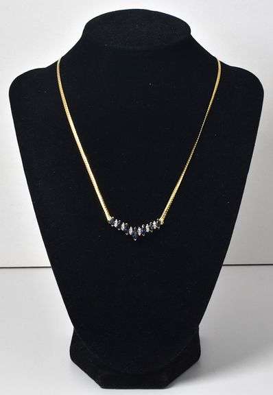 Elegant 14K Yellow Gold Blue Sapphire V-Shaped Pendant Necklace with Diamond Accents