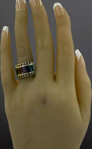 10kt Yellow gold emerald cut and round multi stone cocktail ring