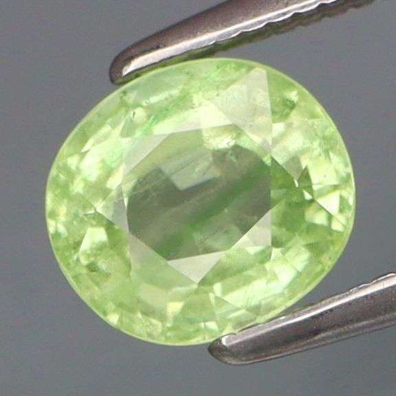 Pale green to fluorescent orange! 1.32ct Tsavorite Garnet!
