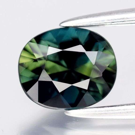 Not blue green, but blue AND green .75ct VVS Sapphire!