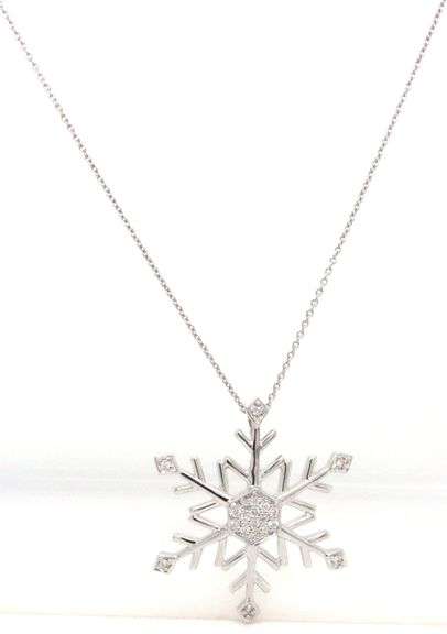 14kt White gold diamond snow flake pendant on chain