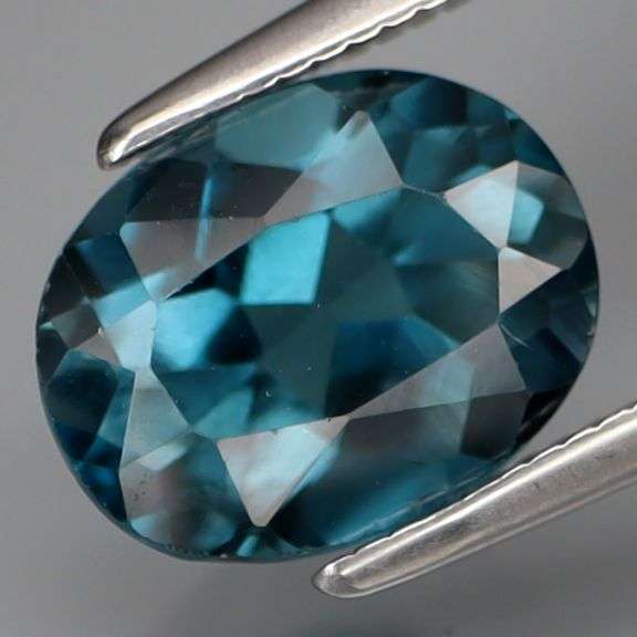 It's 2.19 carats! It's London Blue! It's oval cut! It's 9x7mm!