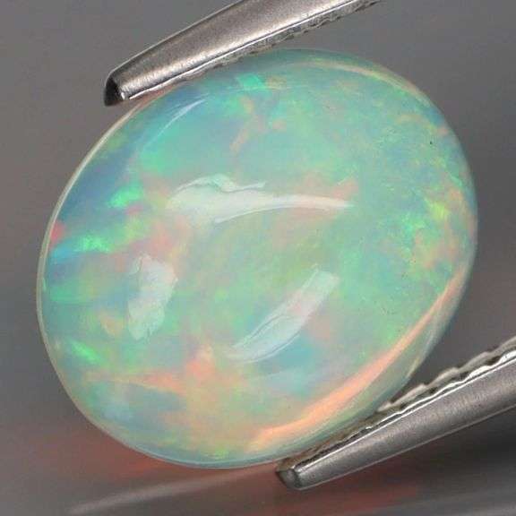 Captivating 2.13ct rainbow flashing Opal