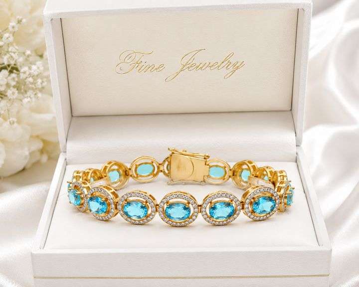 Mesmerizing 11.80CTW Oval Shaped Faceted Apatite & 2.10CTW Diamond Bracelet in 14K Yellow Gold Over