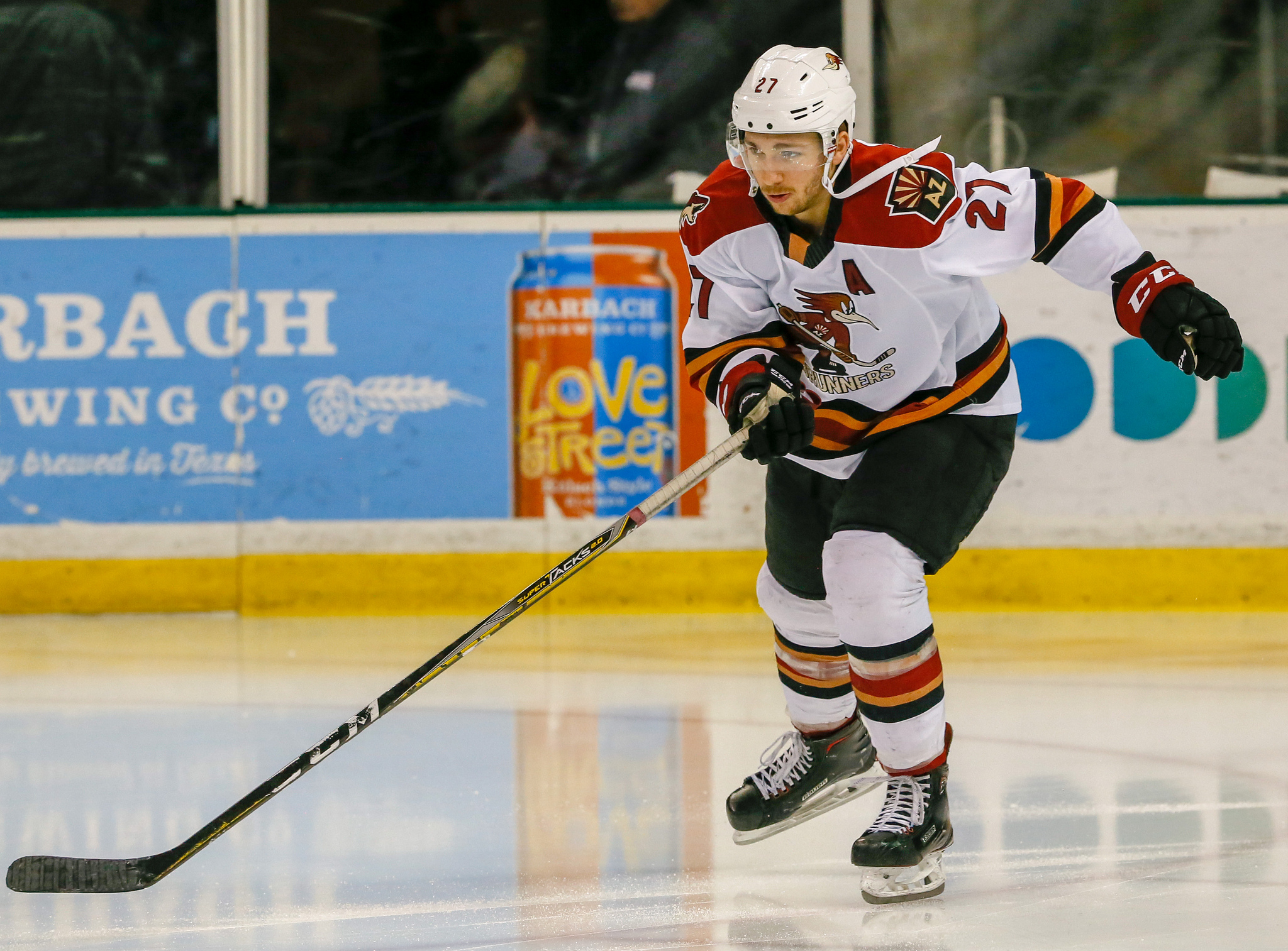 Michael Bunting (27) of the Tucson Roadrunners takes the ice for warmups ahead of an American Hockey League game against the