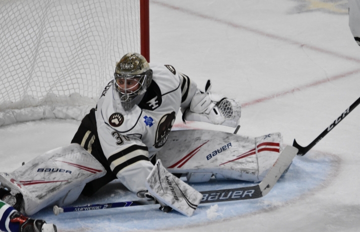 Vitek Vanecek makes a spectacular save Saturday night against Utica.