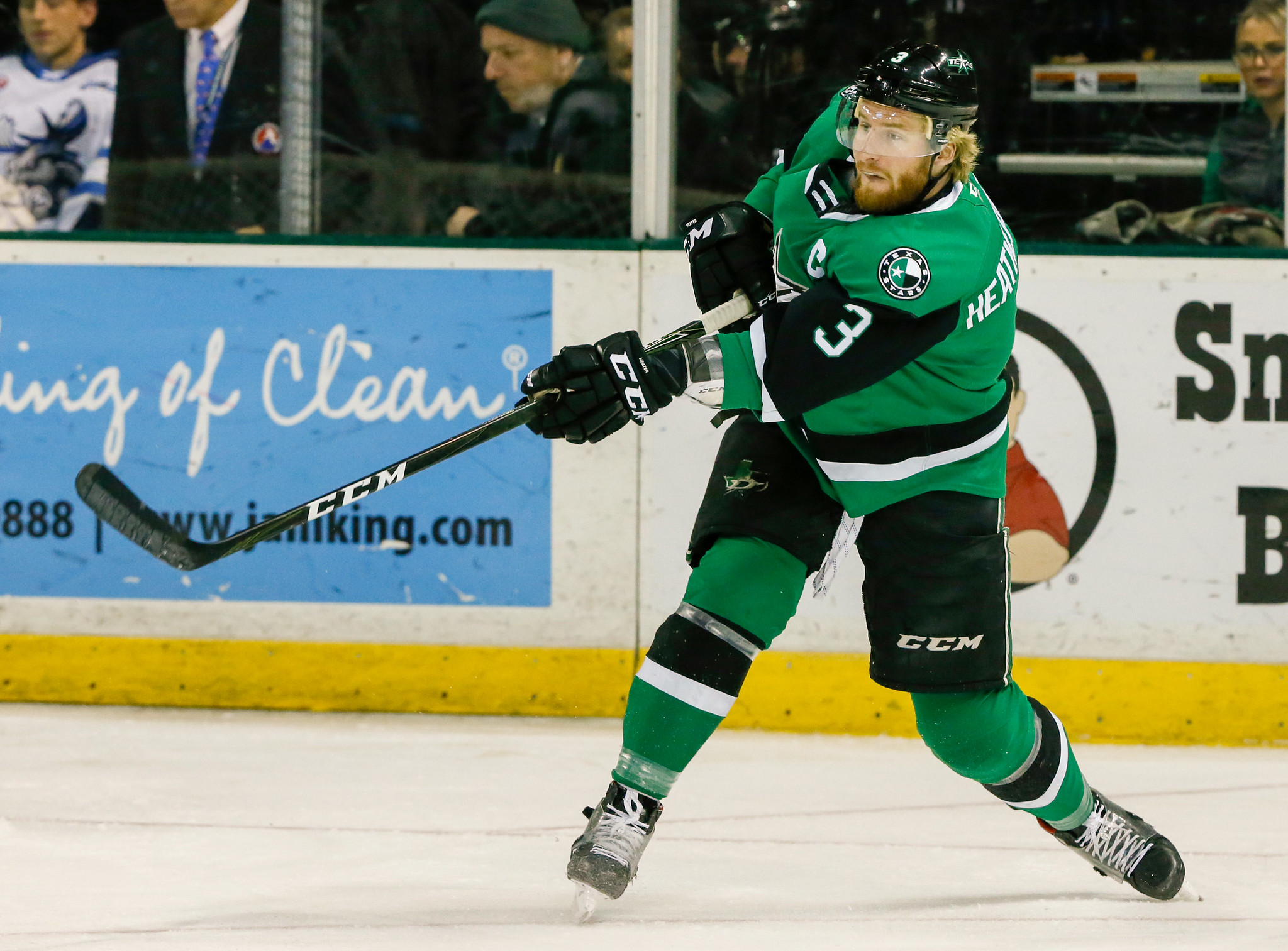 Dillon Heatherington (#3) fires a puck on net in the first period of an American Hockey League game between the Texas Stars a