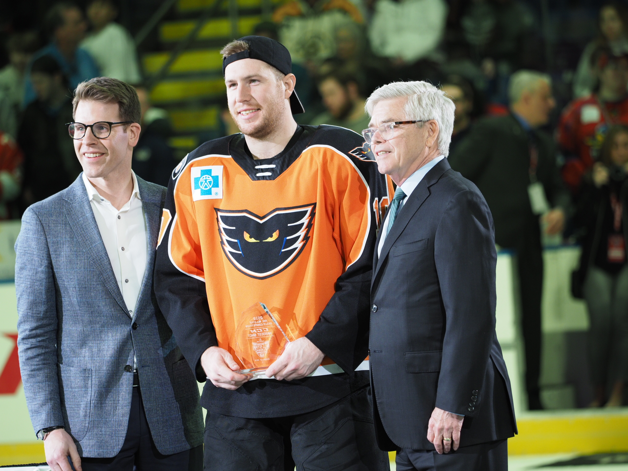 AHL President/CEO David Andrews (right) presents the CCM Hardest Shot Award to Lehigh Valley Phantoms forward Greg Carey afte