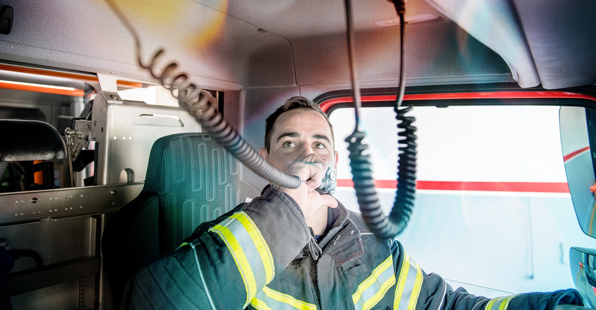 Firefighter in a fire truck