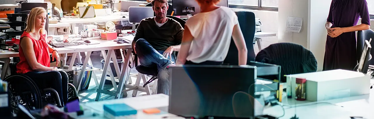 A photo of a creative business team having a discussion in meeting.