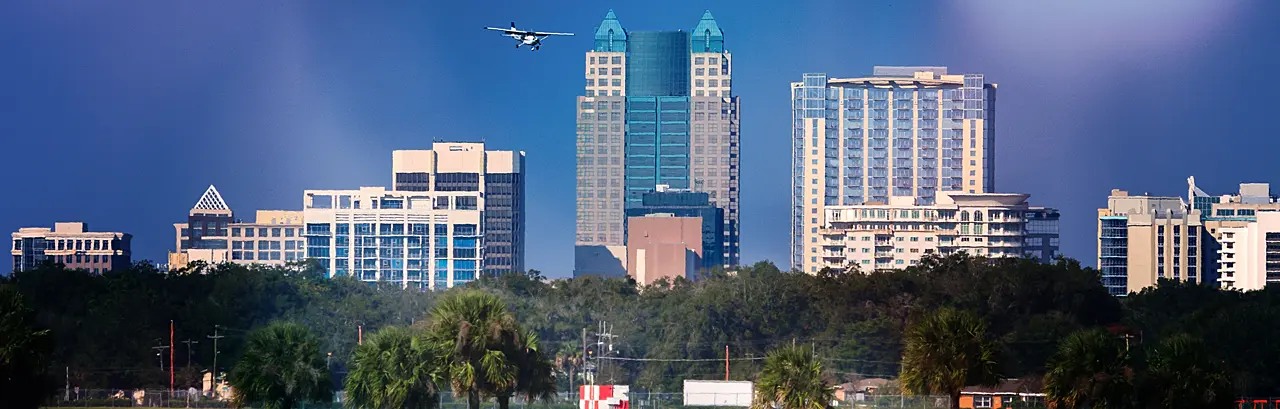 Clear blue sky with a view of the Orlando International Airport.