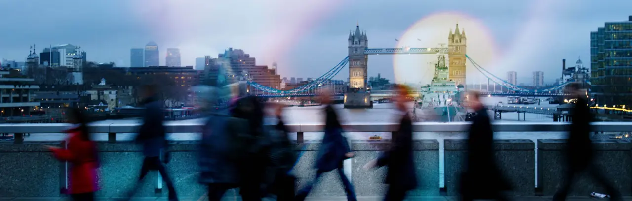 City workers walking to work across London Bridge