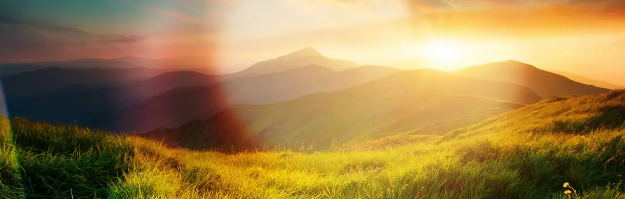 Mountain valley during sunrise. Natural summer landscape