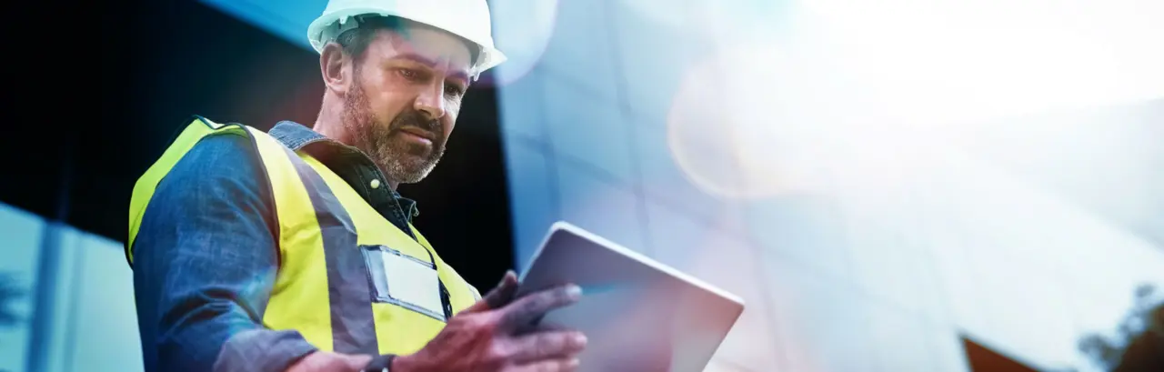 Shot of a engineer using a digital tablet on a construction site